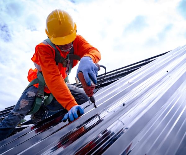 Roofer,Working,On,Roof,Structure,Of,Building,On,Construction,Site,roofer