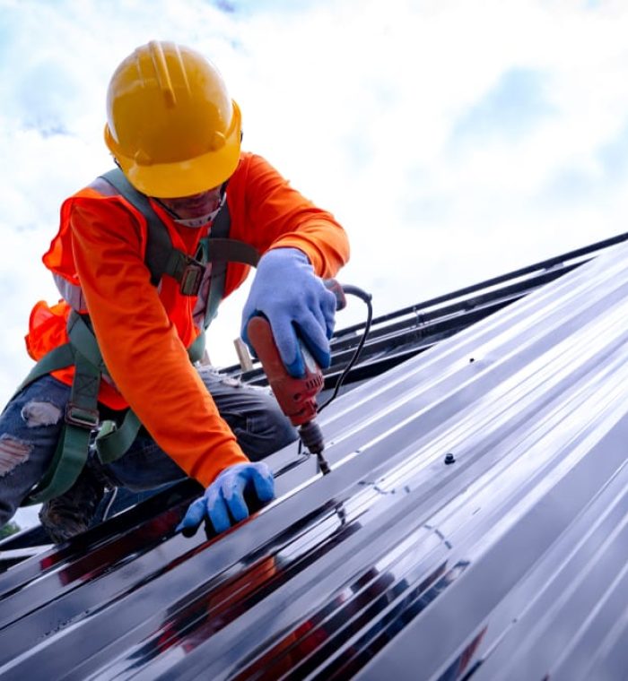 Roofer,Working,On,Roof,Structure,Of,Building,On,Construction,Site,roofer